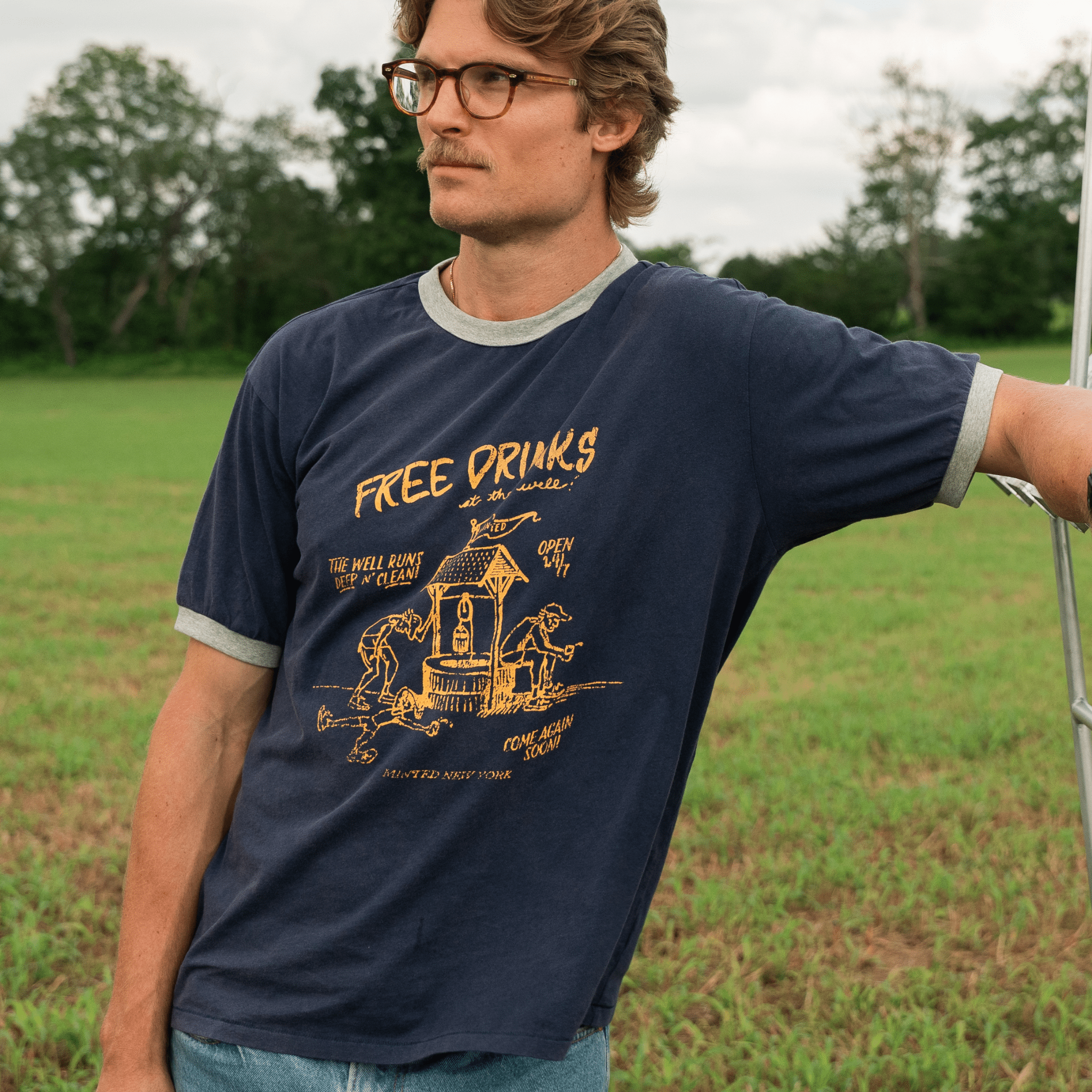LinoCotton Ringer Tee "Free Drinks at the Well" - Minted New York
